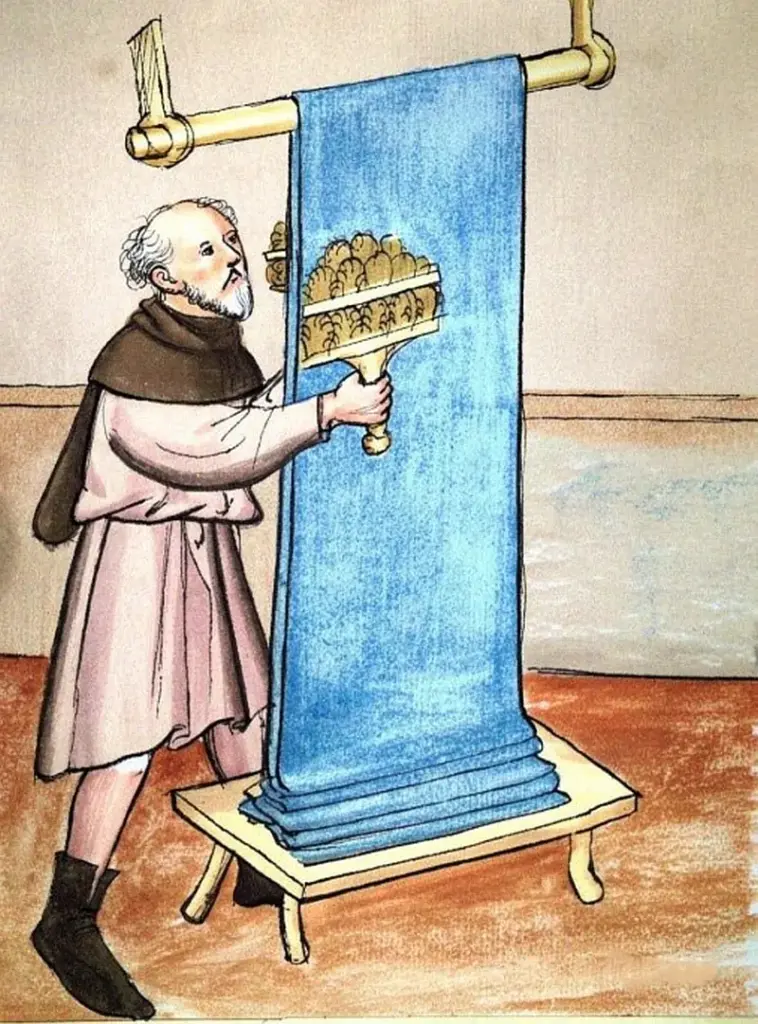 Historische Illustration eines Tuchmachers, der ein blaues Tuch mit einer Karde aufraut